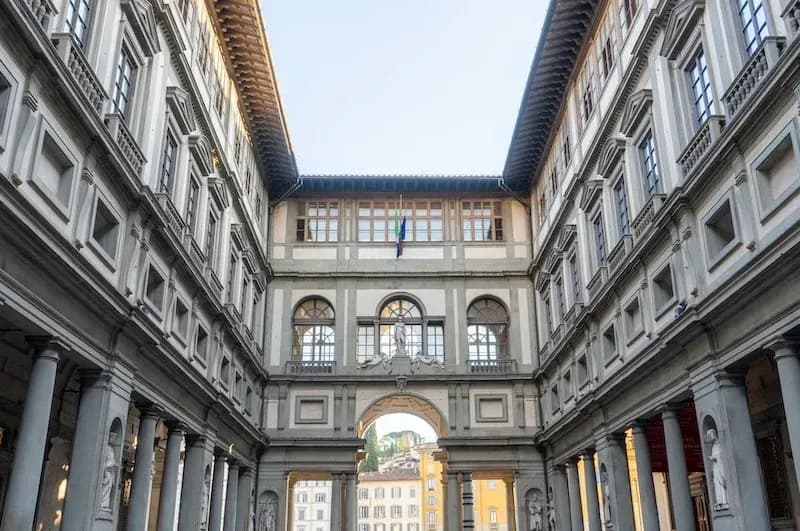 Exterior facade of famous Uffizi Galleries museum with Renaissance architecture in Florence Italy during Carpe Diem Tours art history cultural experience