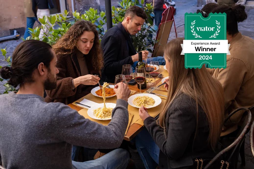 Customers are eating pasta on Rome Food Tour